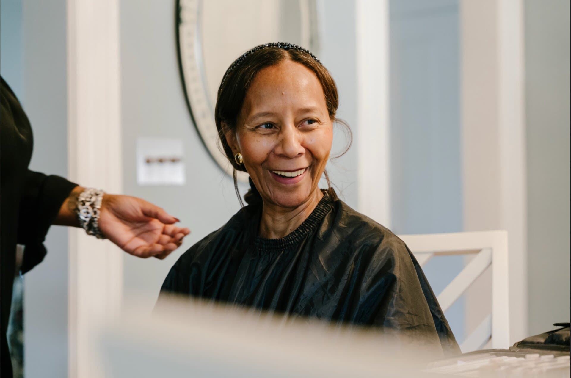 Behind the scenes — Dr. Marian Croak in wardrobe and hair prep